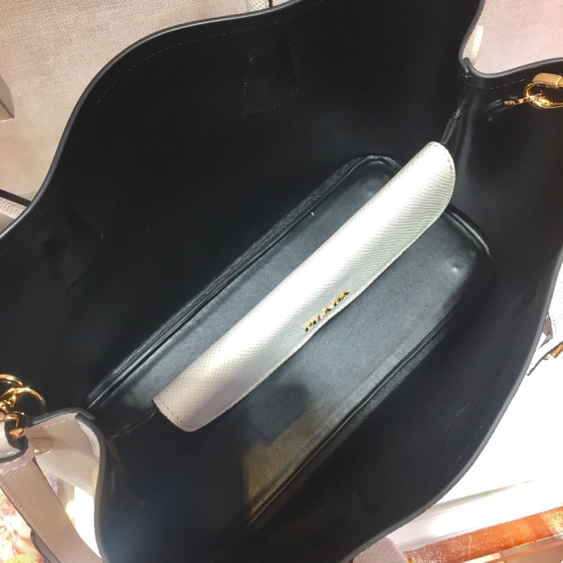 Pra*a top handle bags